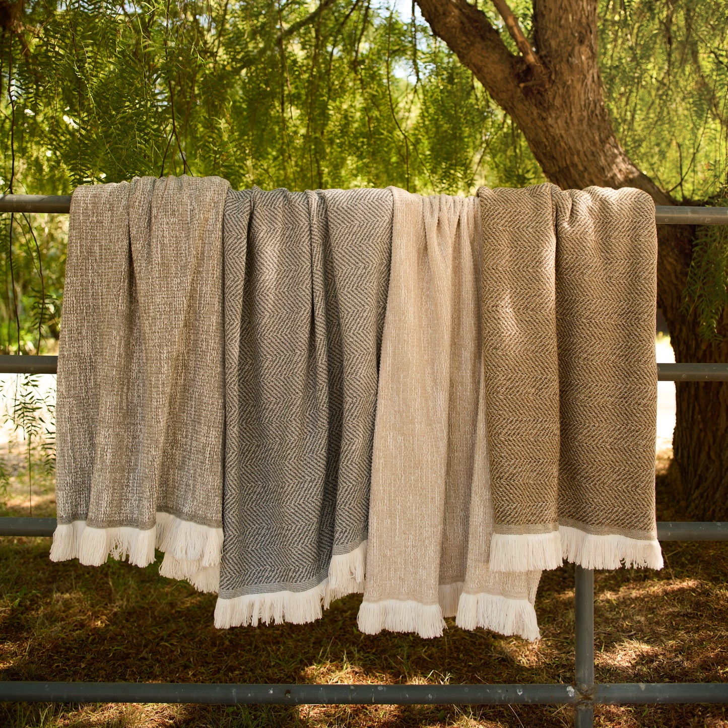 Sunbrella Throws Draped On Fence, image 5