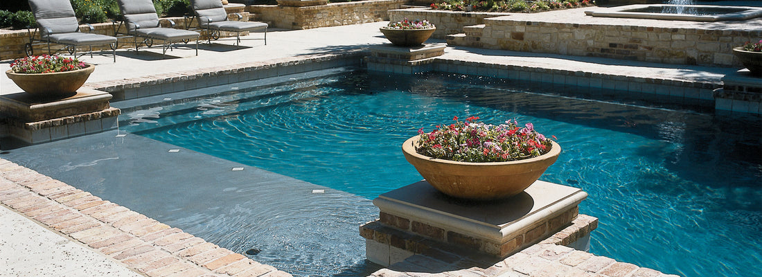 Swimming pool with chaise lounges