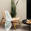 Sunbrella Crosshatch Throw Spa Drapped